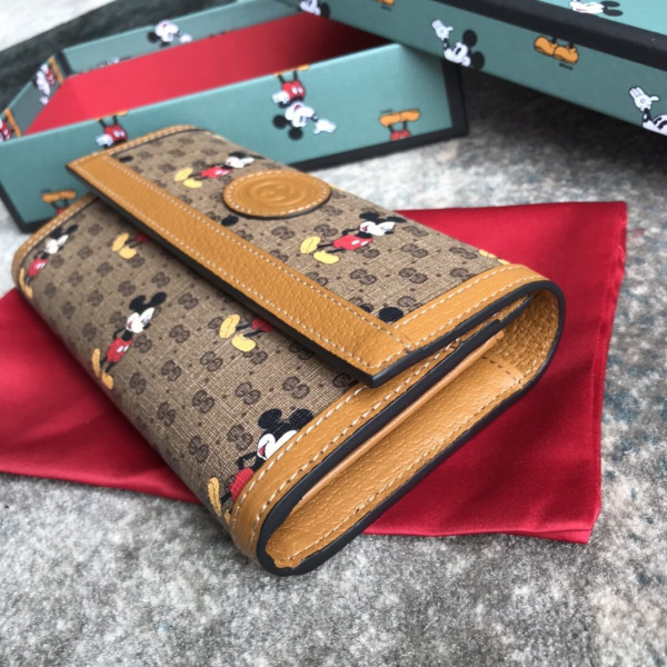 disney x G*u*i gg long wallet